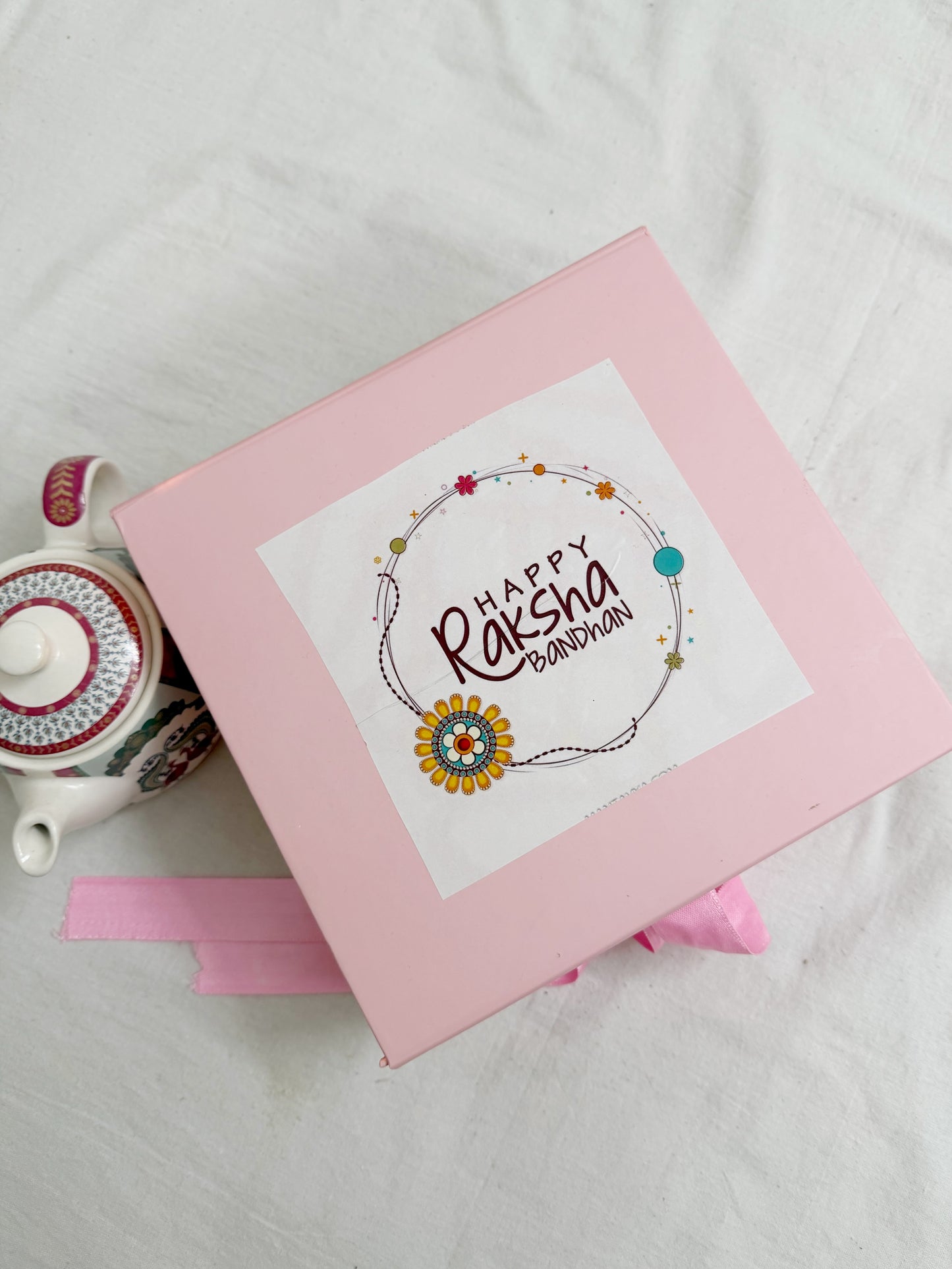 Raksha Bandhan sticker on top