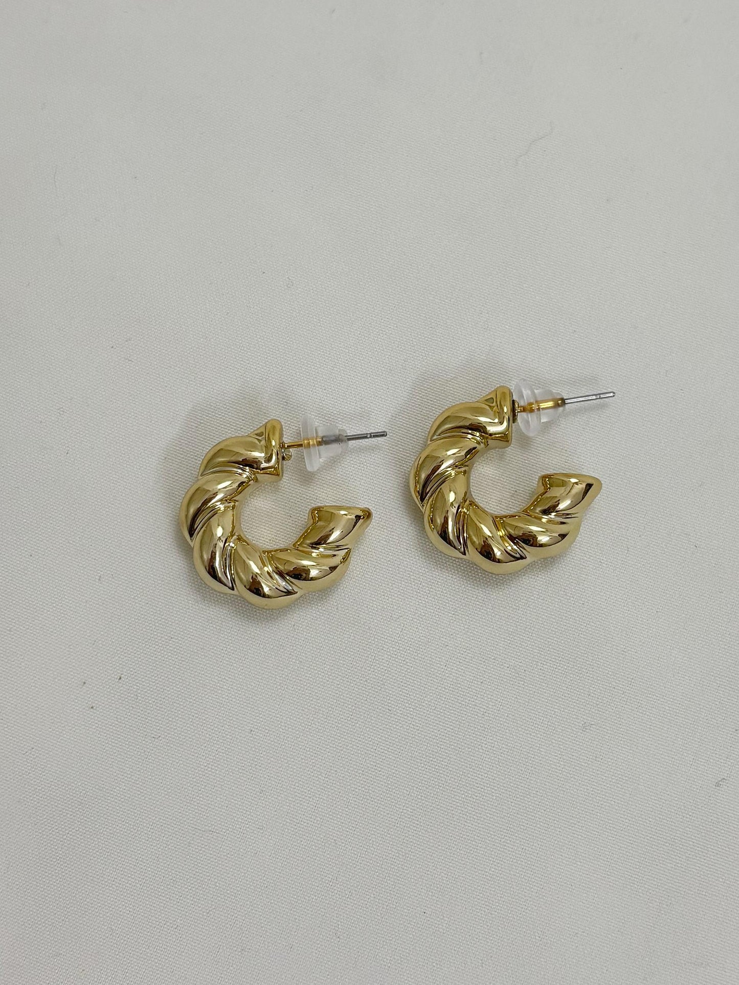 golden swirl statement earrings